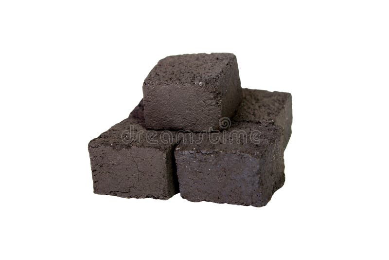 Charcoal for hookah in the form of a cube, isolated on white background, close-up.