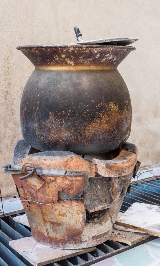 Charcoal stove with sticky rice cooking pot royalty free stock image