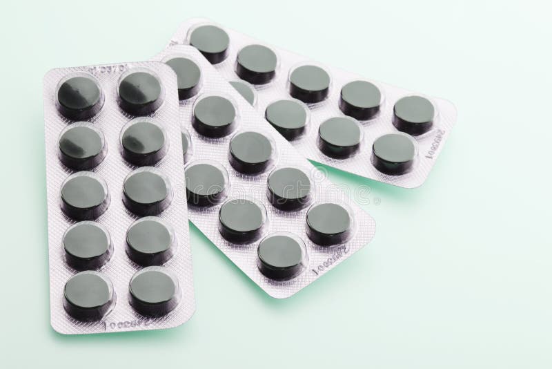 Charcoal tablets stock image. Image of charcoal, cure 20406713