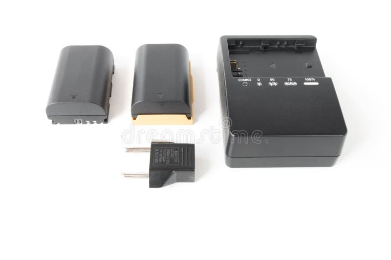 Charger with Batteries for the Camera Stock Photo Image of supply