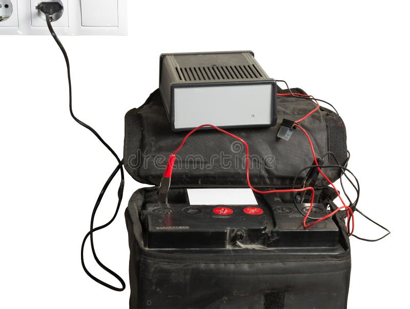 Charging the Car Battery with a Charger. Car Service. Isolated on White