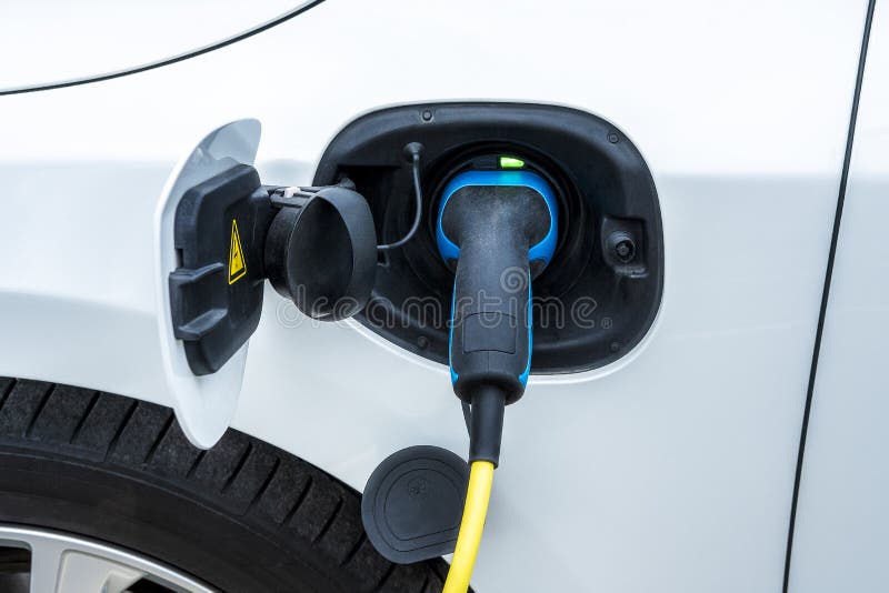 Charging an electric car battery stock image Charging an electric car battery stock image
