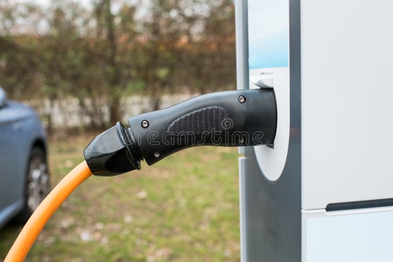 Charging Station with Plug and Car Stock Photo Image of technology, charging 64277546