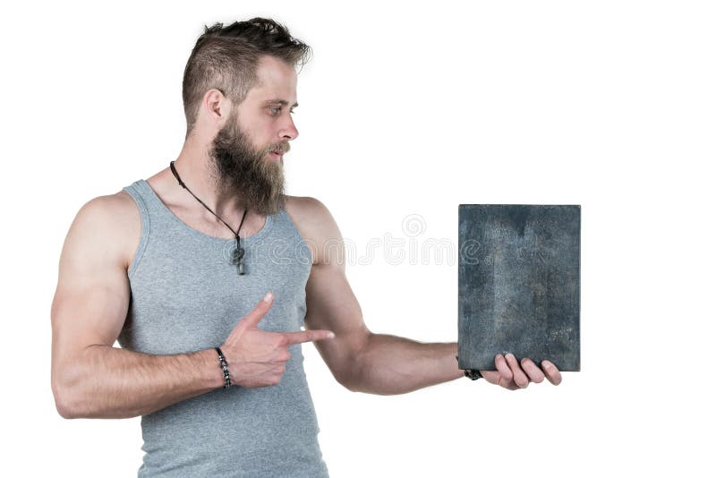 A charismatic man with a beard holds an empty sign for a copy space, on a white isolated background. Horizontal frame stock images