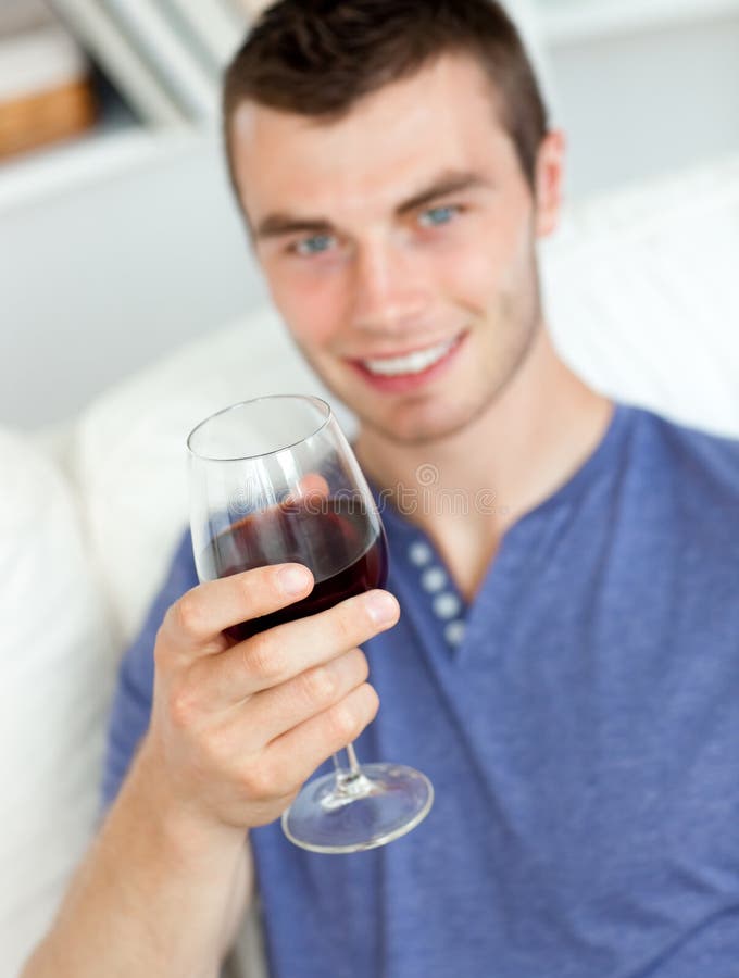 Charismatic Young Man Holding a Glass of Wine Stock Image Image of