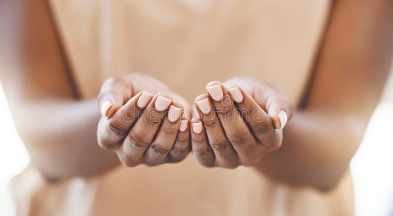 Charity, open hands and a praying woman in a christian worship church for spiritual wellness. Closeup of palms of an