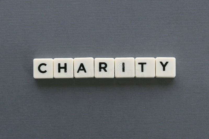 Charity Word Made of Square Letter Word on Grey Background. Stock Image