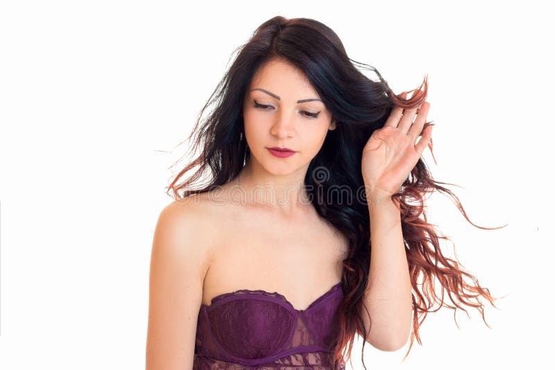 Charming woman in magenta peignoir with closed eyes isolated on white background. Charming woman in magenta peignoir with closed eyes isolated on white background