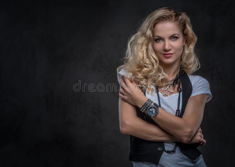 Curly Blonde Female Dressed in a White T-shirt and Wears a Lot Accessories and Wristwatch, Posing Stock Image - Image of curly, glamour: 148359125