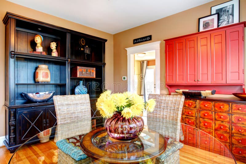 Charming Dining Room with Glass Dining Table and Wicker Rustic C Stock