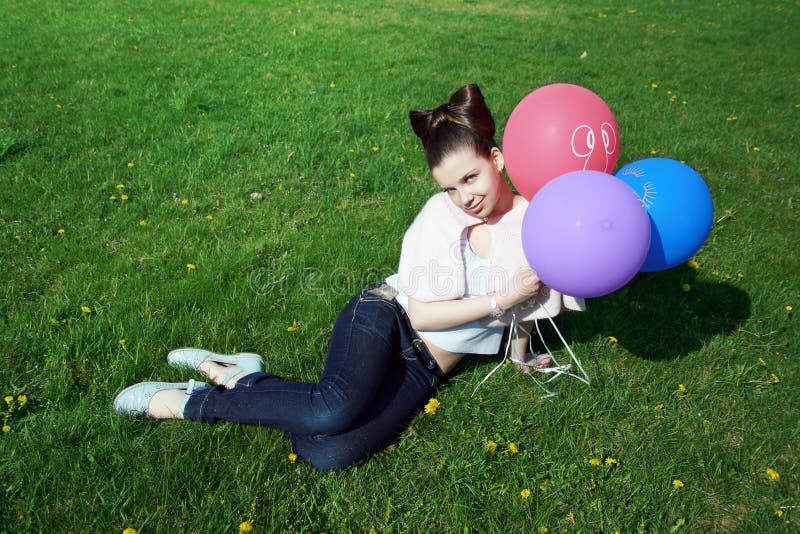 Charming girl with balloons