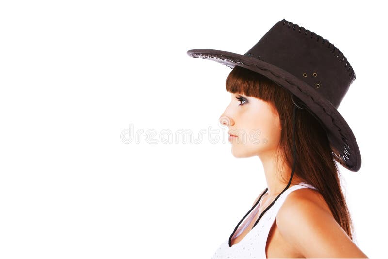 Charming girl in cowboy hat