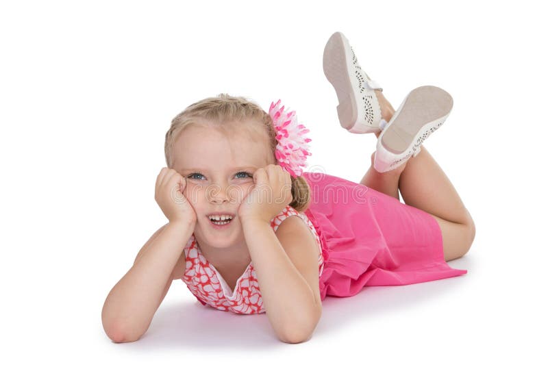 A Little Girl on a Wooden Floor Stock Image - Image of cute, rest: 27553207