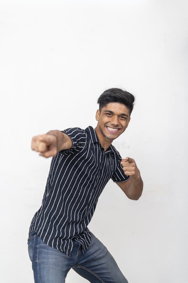 Portrait of stylish man on night city background pose to camera Stock Photo  | Adobe Stock