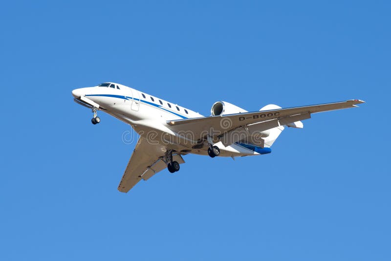 SAINT PETERSBURG, RUSSIA - MARCH 20, 2016: Cessna 750 Citation X D-BOOC Air X Charter before landing in Pulkovo airport. SAINT PETERSBURG, RUSSIA - MARCH 20, 2016: Cessna 750 Citation X D-BOOC Air X Charter before landing in Pulkovo airport