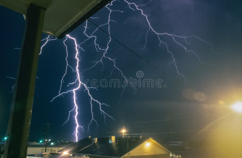 After chasing a tornadic supercell in the Haskell - Trockmorton - New Castle area we ended up in our motel in Jacksboro, Texas.nHere, the storm still produced dangerously close CG lightning as can be seen in the photograph. My greatest fear was that the powerlines, which were close to our location, would be hit by lightning. After chasing a tornadic supercell in the Haskell - Trockmorton - New Castle area we ended up in our motel in Jacksboro, Texas.nHere, the storm still produced dangerously close CG lightning as can be seen in the photograph. My greatest fear was that the powerlines, which were close to our location, would be hit by lightning....