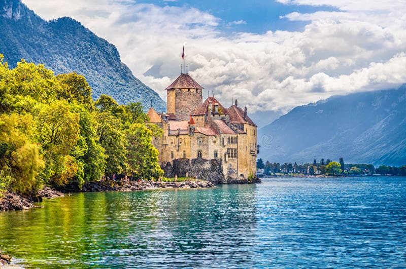 Beautiful view of famous Chateau de Chillon at Lake Geneva, one of Switzerland's major tourist attractions and one of the most visited castles in Europe, Canton of Vaud, Switzerland. Beautiful view of famous Chateau de Chillon at Lake Geneva, one of Switzerland's major tourist attractions and one of the most visited castles in Europe, Canton of Vaud, Switzerland.