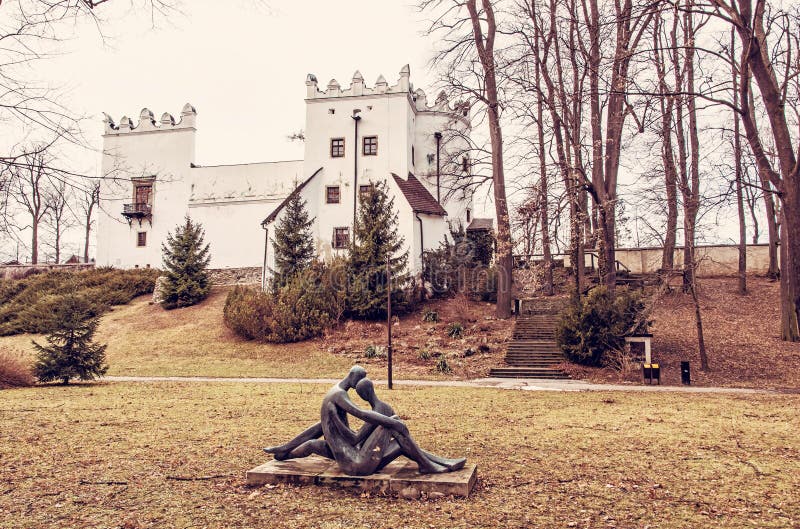 Chateau Strazky and statue of lovers, red filter