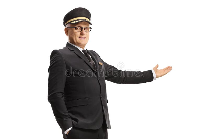 Chauffeur in einer einheitlichen Position mit Hand. Chauffeur in Uniform mit Hand isoliert auf weißem Hintergrund