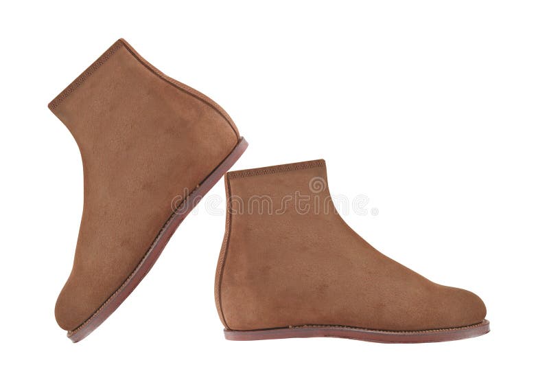Chaussures en cuir de suède de Brown d'isolement sur le blanc photo libre de droits