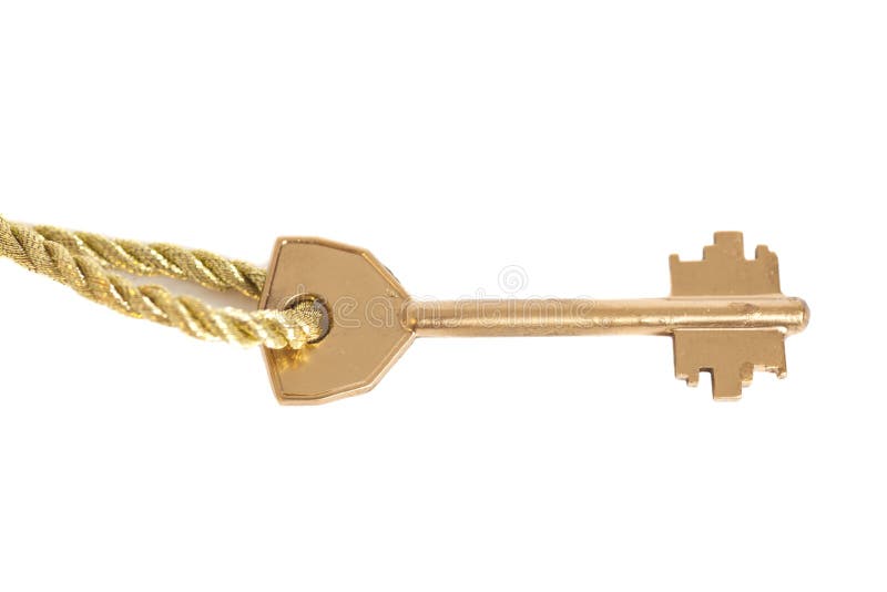 Chave dourada que pendura na corrente do ouro imagem de stock Chave dourada que pendura na corrente do ouro imagem de stock