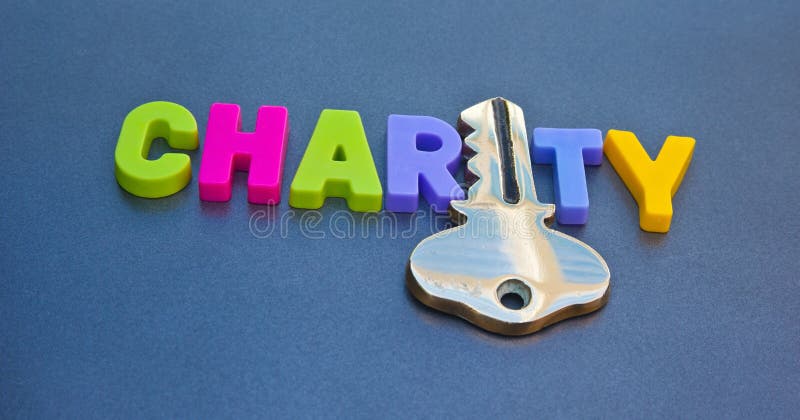 Text 'charity' in colorful uppercase letters with letter 'i' replaced with gold key. Concept of raising money for charity or obtaining help from charitable organizations. Text 'charity' in colorful uppercase letters with letter 'i' replaced with gold key. Concept of raising money for charity or obtaining help from charitable organizations.