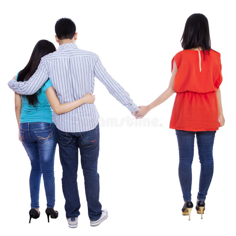 A young men cheating with another women isolated over white background. A young men cheating with another women isolated over white background