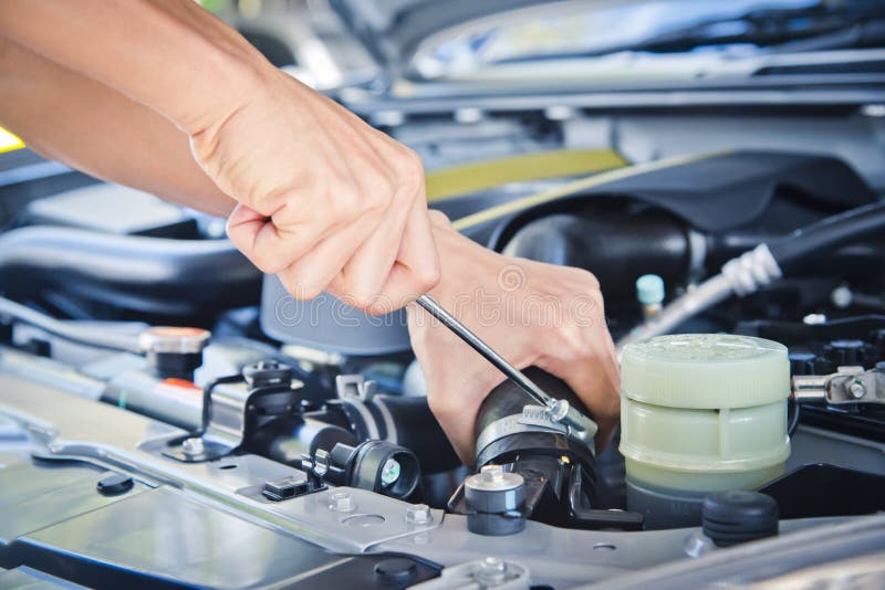 Check the car engine. stock photo. Image of coveralls 78457034