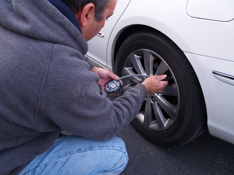 Checking Air Pressure in Tire Stock Image Image of problem, checking
