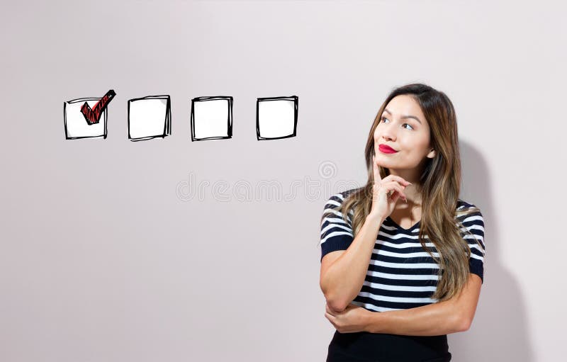 Checklist with young businesswoman stock photo Checklist with young businesswoman stock photo