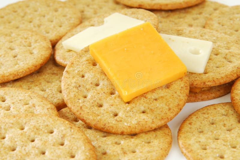 Cheddar Cheese on a Cracker Stock Photo Image of swiss, nutrition