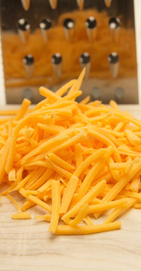 Grated cheddar cheese stock photo. Image of block, sharp - 52566266