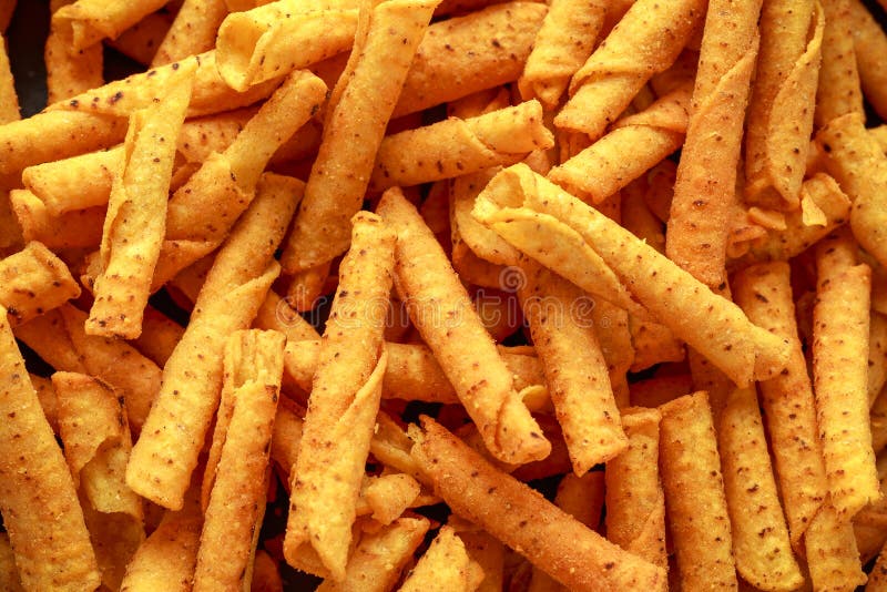 Cheddar Cheese Tortilla Rolls, Chips Close Up, Background. Stock Image