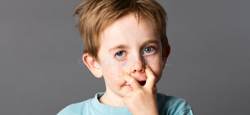 Little Blond Boy Making Scared Face Stock Photo, Picture and