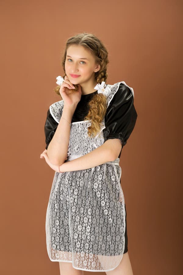 Cheerful Blonde Teen Girl in Retro School Uniform Stock Photo - Image ...