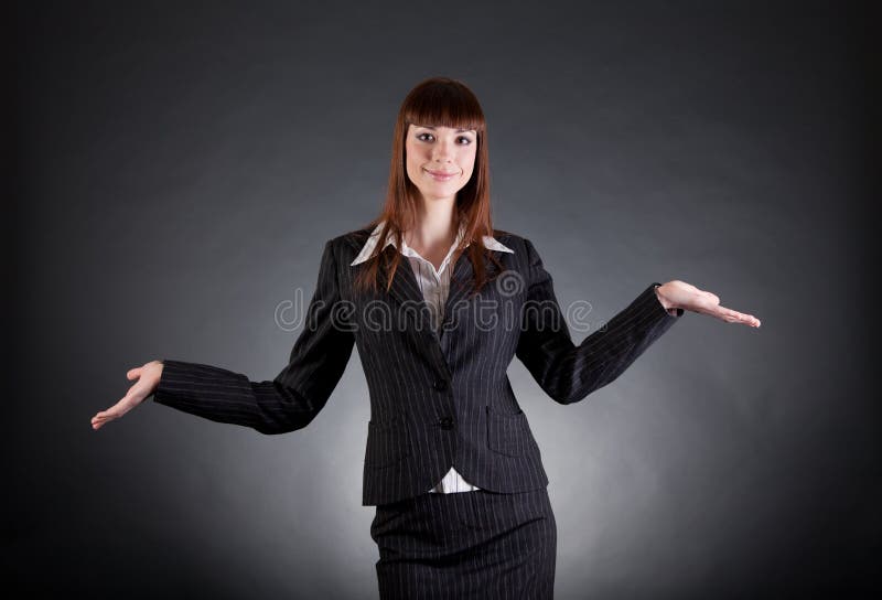 Cheerful business woman showing open hands