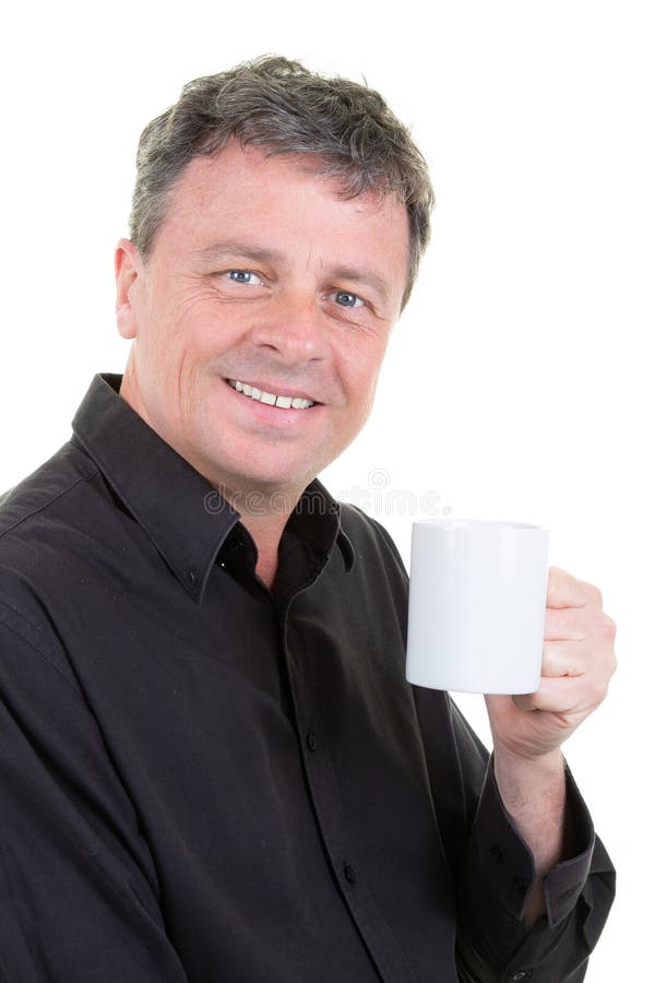 Cheerful businessman with cup of coffee mug tea enjoy with blue eyes royalty free stock image