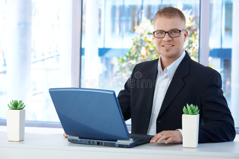 Cheerful businessman in office