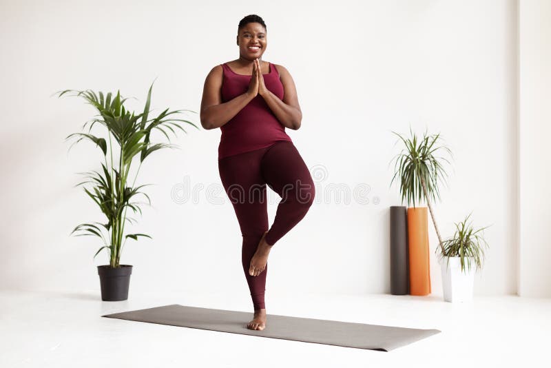 Chubby Black Woman Holding Yoga Mat at Studio Stock Photo - Image