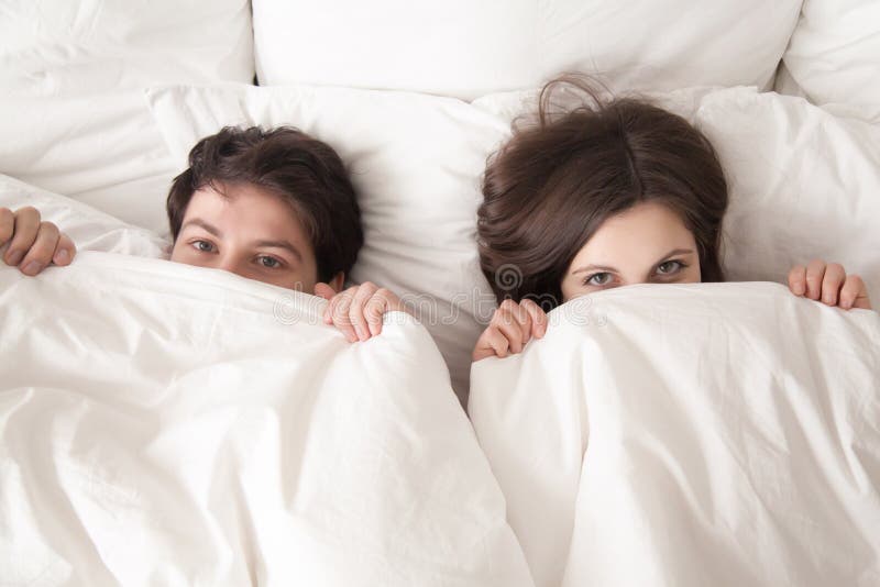 Joyful Married  Couple  Lying In Bedroom Stock Photo Image 