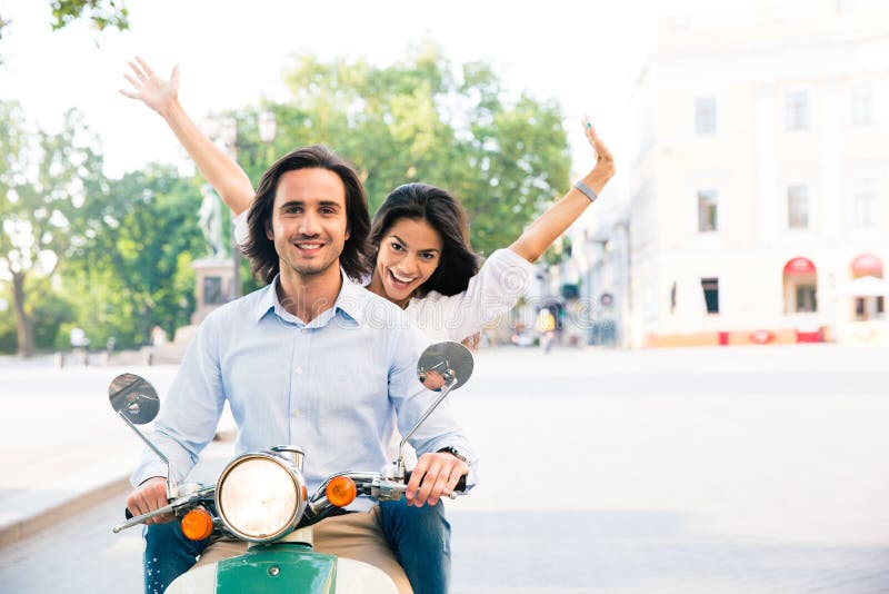 Cheerful Couple Riding on a Scooter Stock Image - Image of motor, love ...