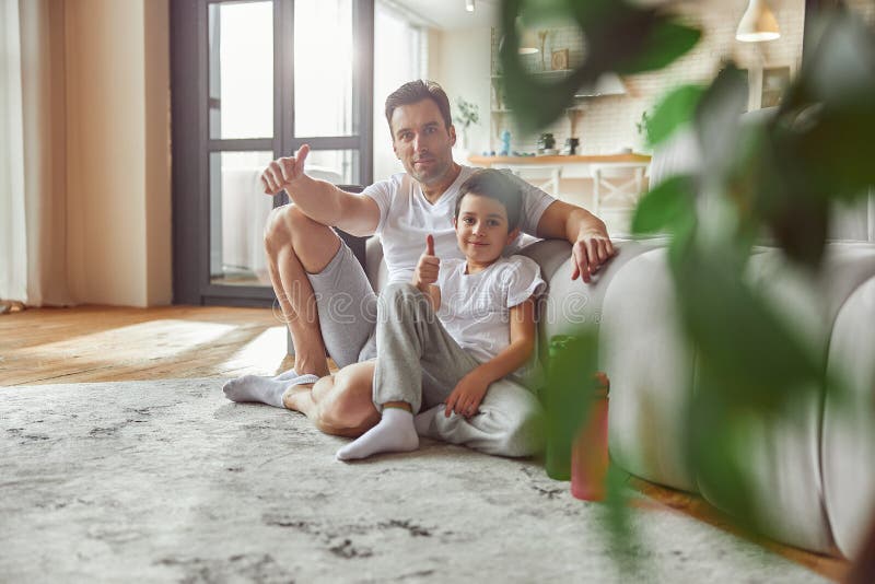 Cheerful Dad and Son during Active Day at Home Stock Image - Image of ...