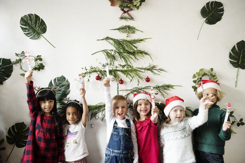 Cheerful diverse kids at Christmas stock photos Cheerful diverse kids at Christmas stock photos