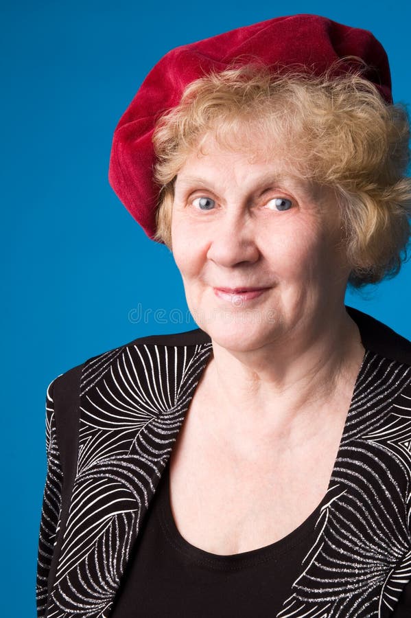 The cheerful elderly woman.