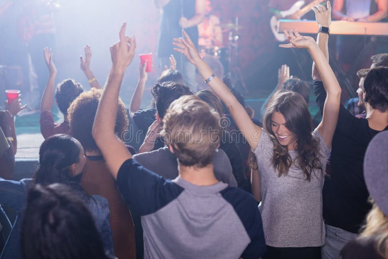 Cheerful Fans Dancing at Nightclub during Music Festival Stock Photo ...