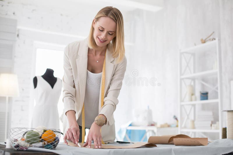 Cheerful Female Tailor Marking Pattern Stock Photo - Image of ...