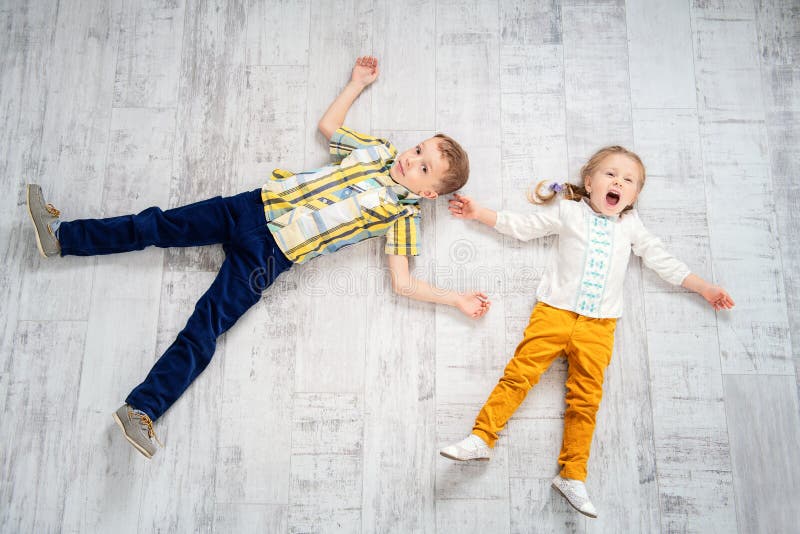 Cheerful kids on floor