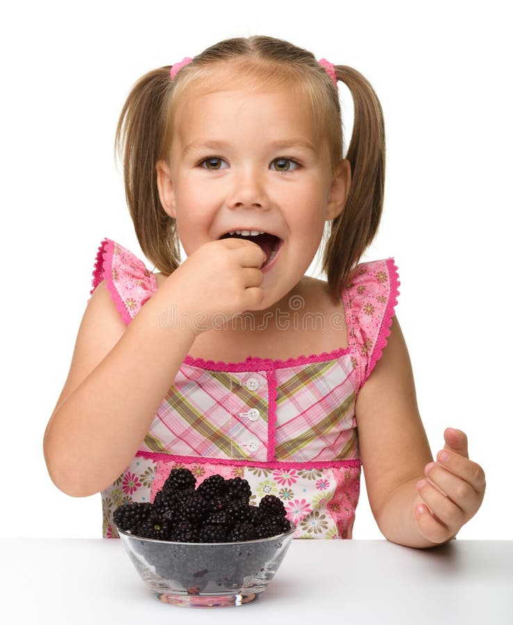 Cheerful Little Girl is Eating Blackberry Stock Photo Image of little, enjoy 21122178