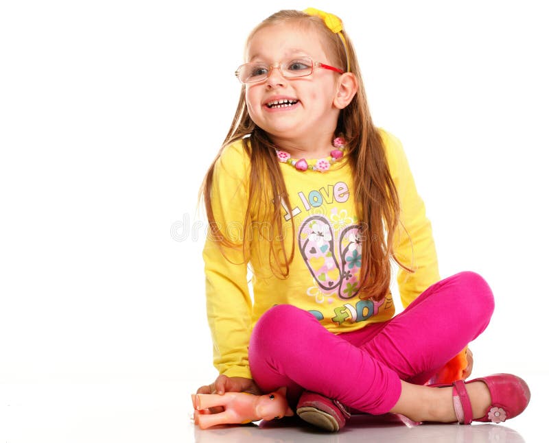 Cheerful little girl glasses funny and toy isolated