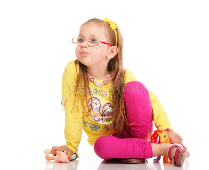 Cheerful little girl glasses funny and toy isolated